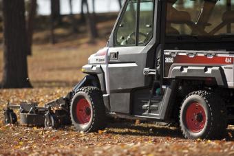 Side profile of Bobcat UTV mower attachment mounted on a 3650 utility vehicle. 