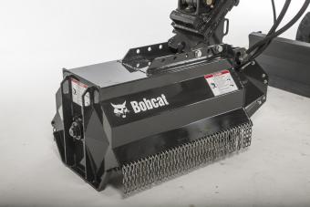 Close-up studio shot of Bobcat flail mower attachment.