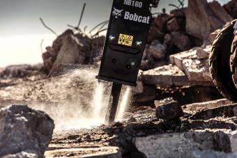 Bobcat S770 skid-steer loader and nitrogen breaker attachment.